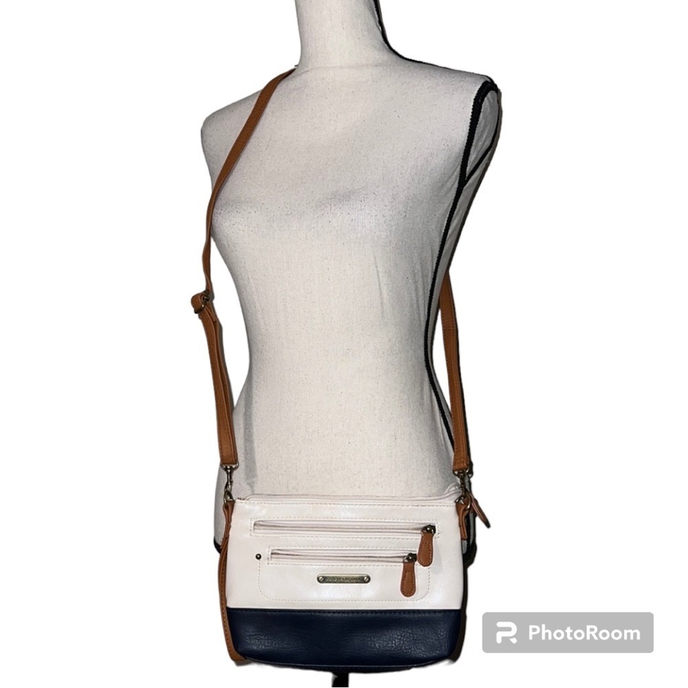 Stone Mountain crossbody creme blue with tan straps removable also wrist strap